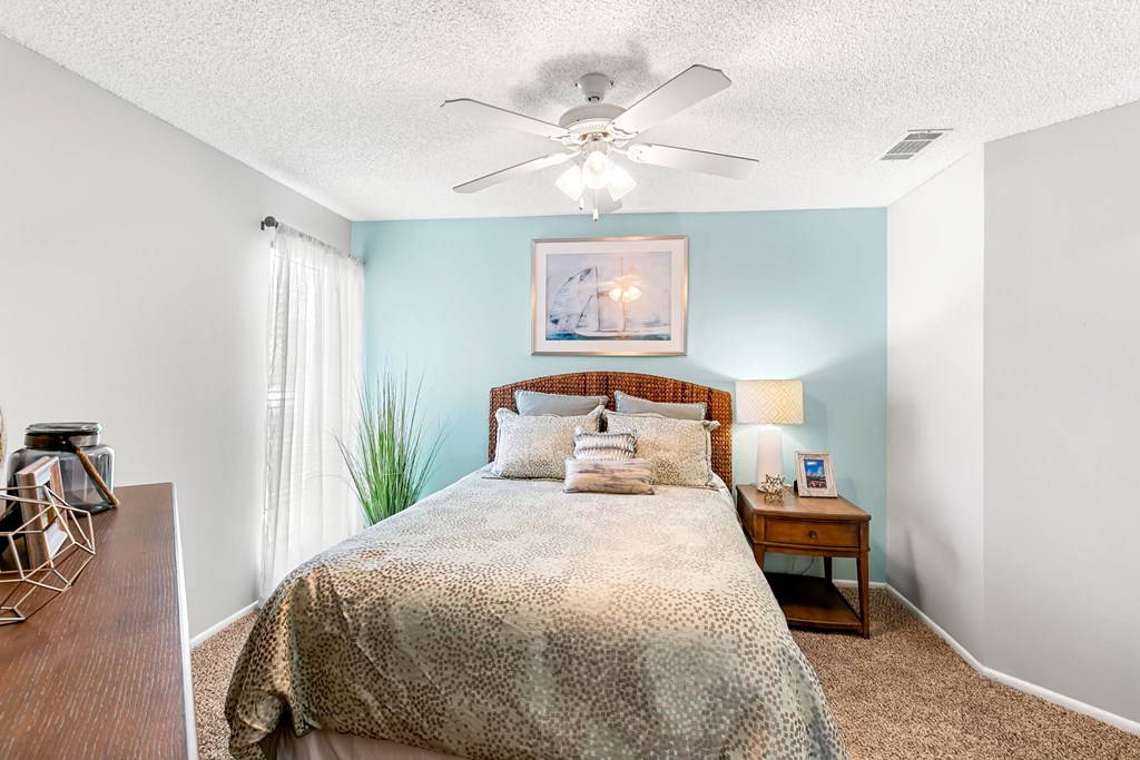 Bedroom Featuring Lots Of Natural Light With Large Window