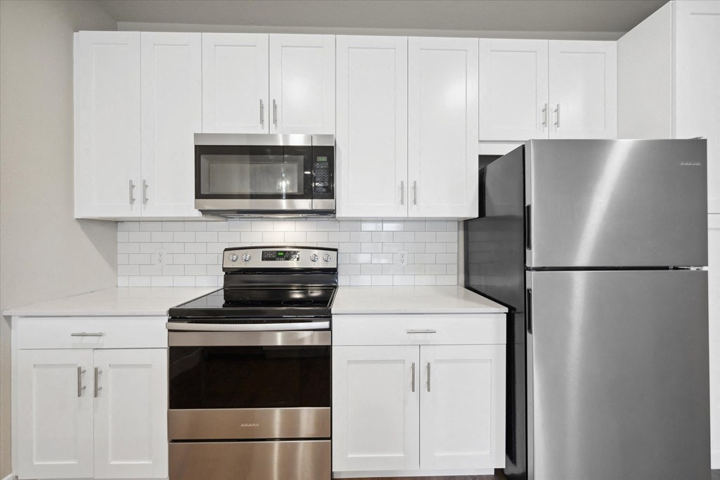 Kitchen With Tile Backsplash
