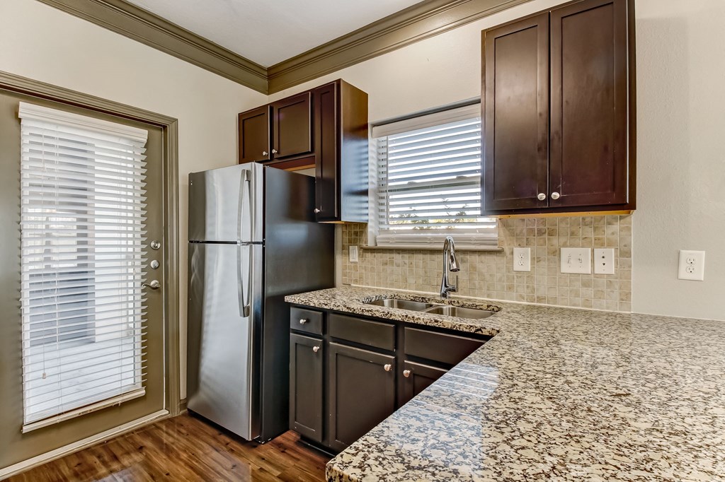 Fully-Equipped Kitchen with Granite Countertops