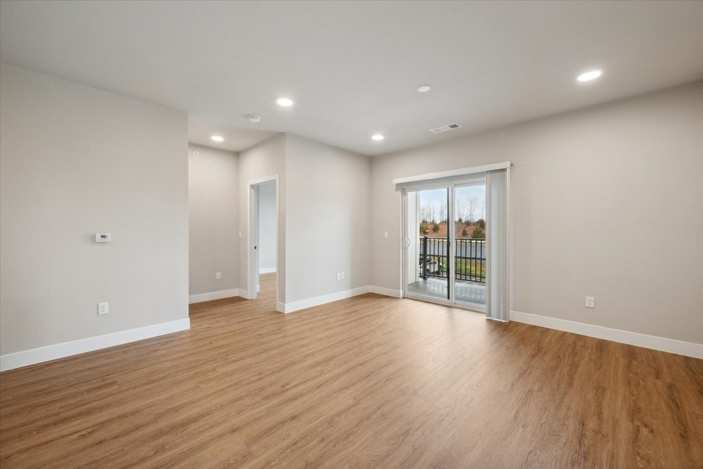 Spacious Living Area with Overhead Lighting