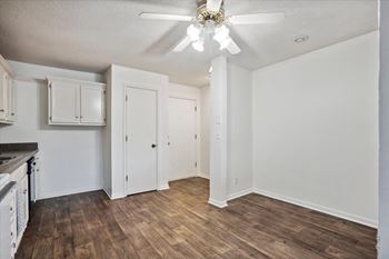 Kitchen with Dark Vinyl Plank Flooring