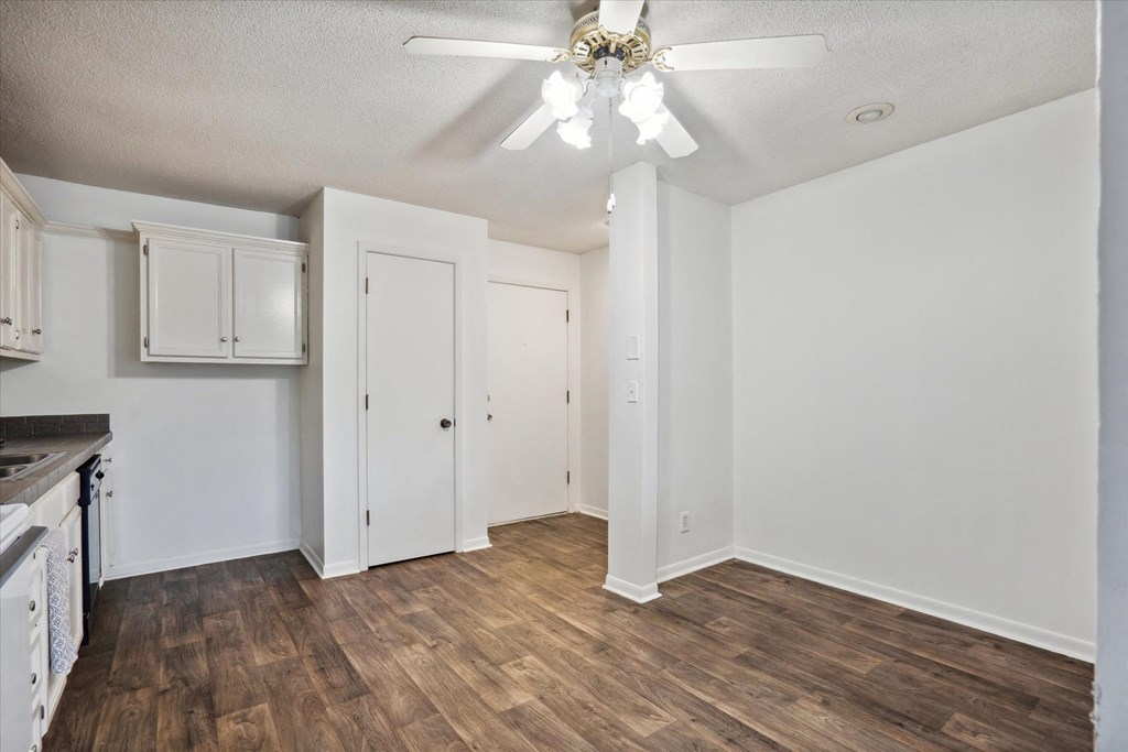 Kitchen with Dark Vinyl Plank Flooring