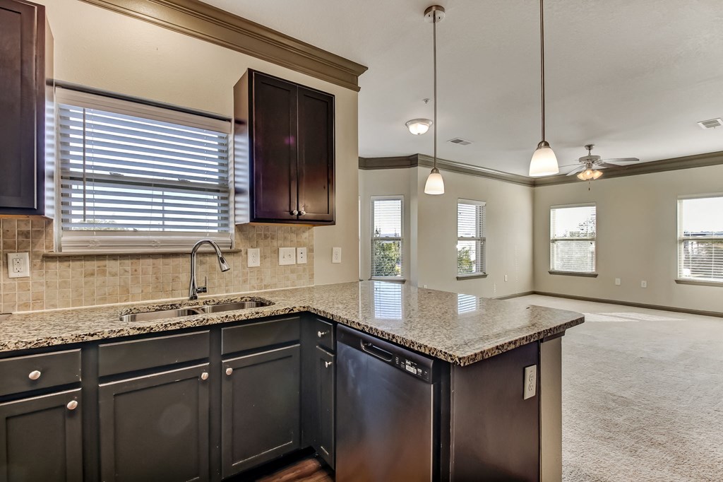 Fully-Equipped Kitchen with Granite Countertops