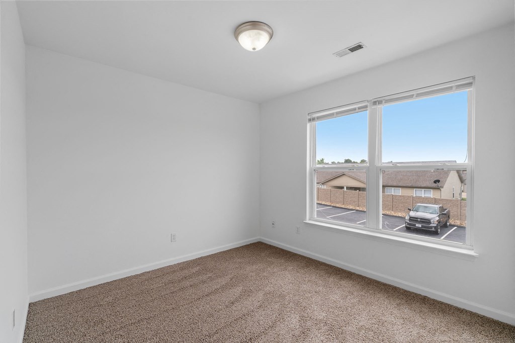 Bedroom with Large Windows