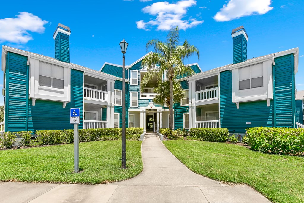 Exterior Entrance To Apartment Homes At Isles Of Gateway