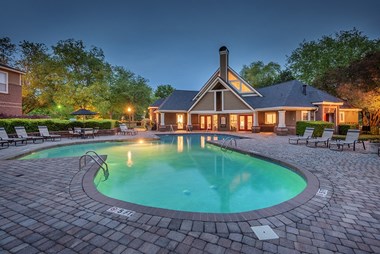 Outdoor Pool & Sundeck At Dusk