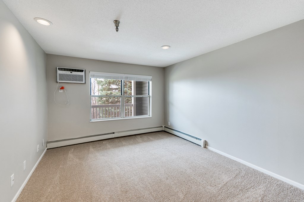 Bedroom with Large Double Windows and Recessed Lighting