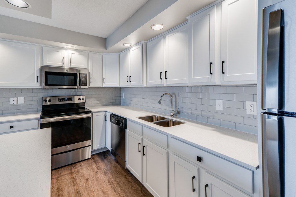 Kitchen with White Cabinetry and Upgraded Hardware