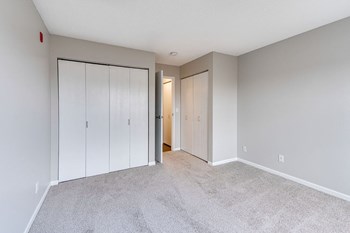 Bedroom with Plush Carpet and Two Closets - Photo Gallery 12
