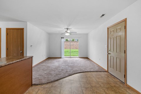 Spacious Living Area with Carpet