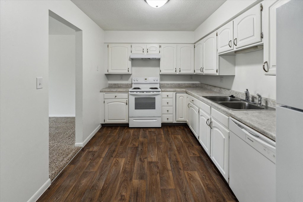 Fully Equipped Kitchen with White Appliances