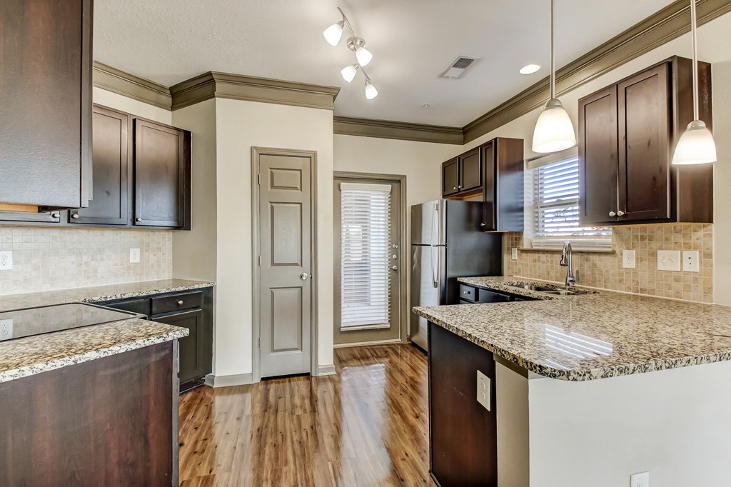 Kitchen with Upscale Wood Finish Flooring
