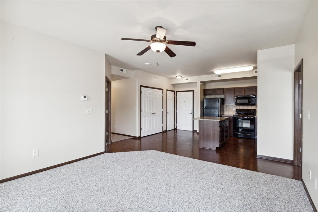 Spacious Living Area with Carpet
