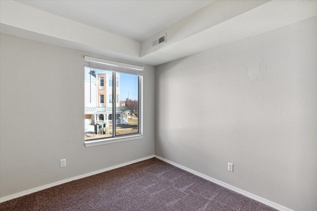 Bedroom with Vaulted Ceiling