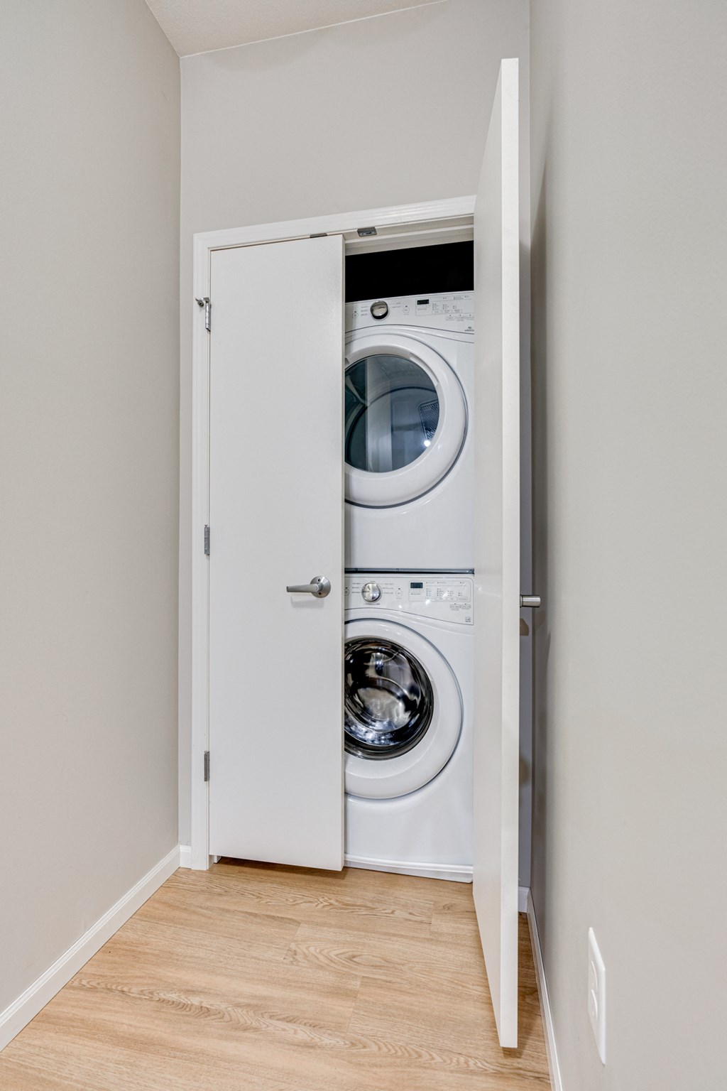 Closet Featuring Stackable Washer & Dryer