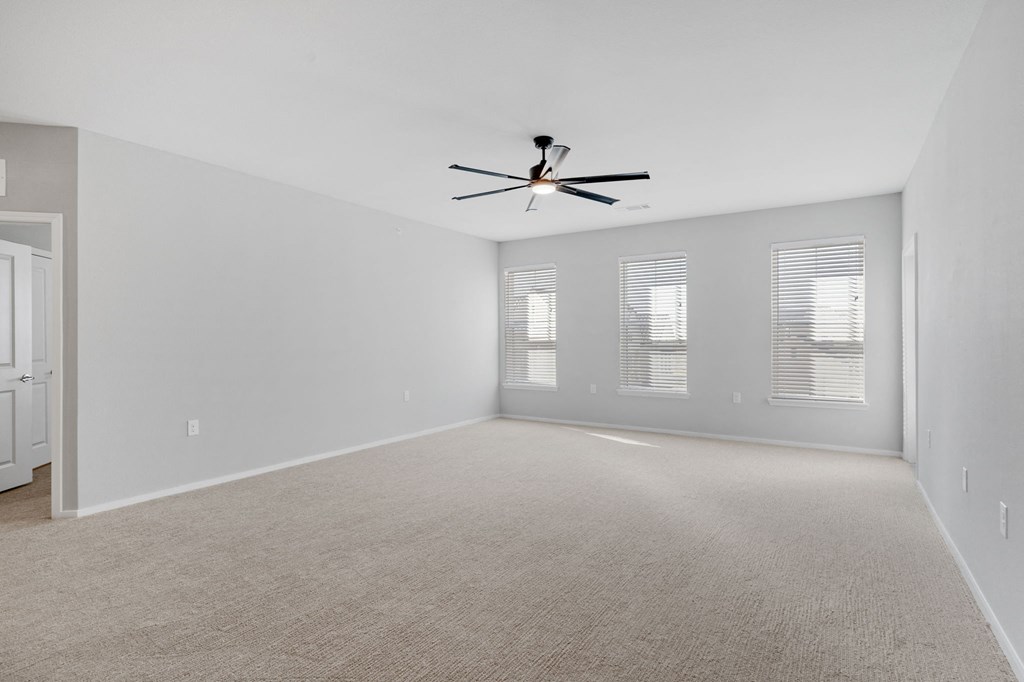 Spacious Living Area with Carpet