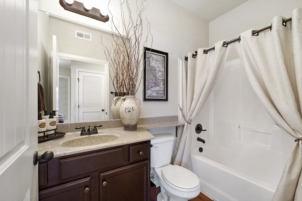 Bathroom With Granite Vanities