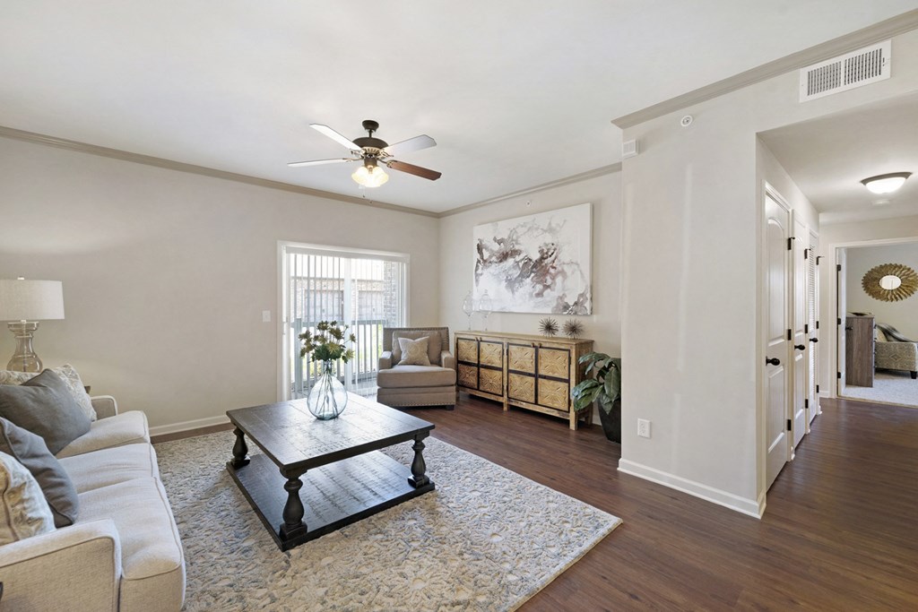 Spacious Living Area with Hardwood-Style Flooring