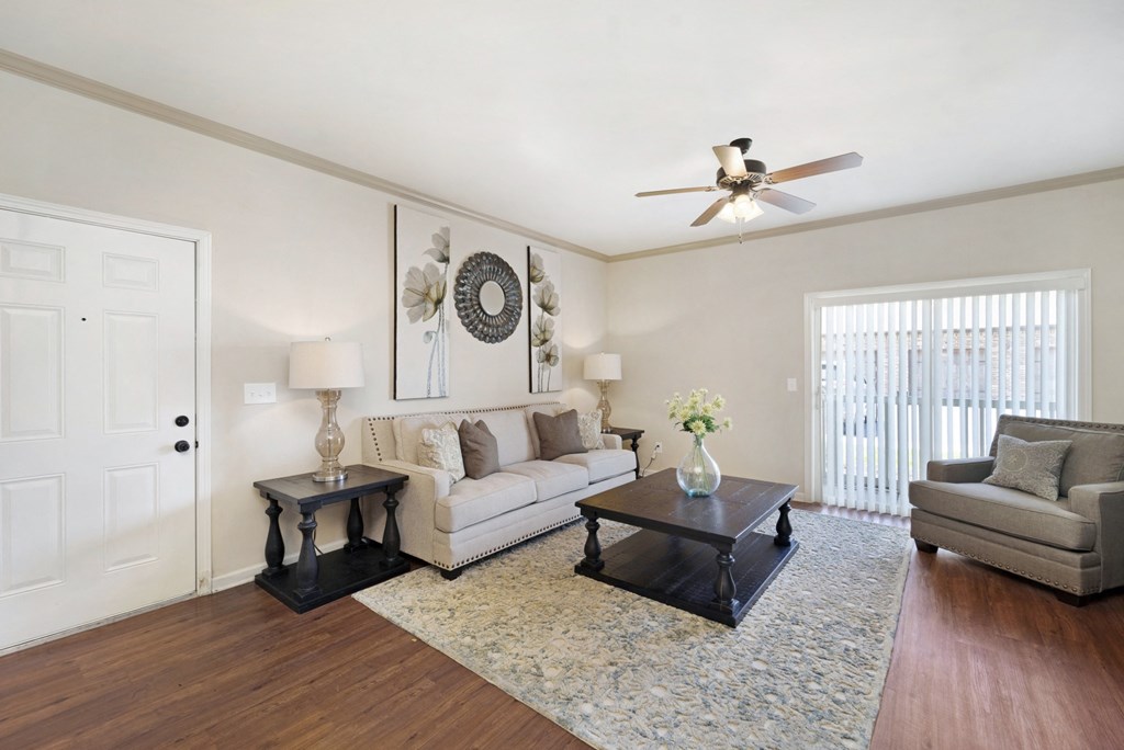 Spacious Living Area with Hardwood-Style Flooring