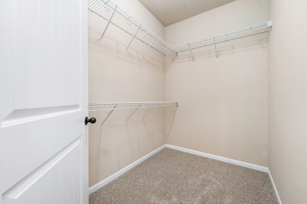 Walk-In Closet With Built-In Shelving