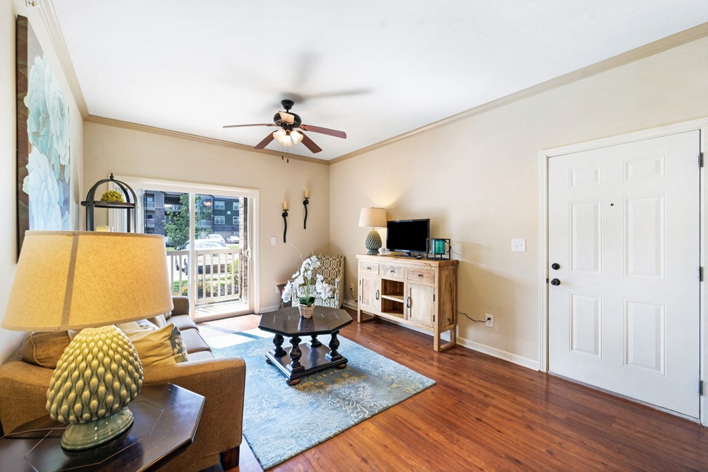 Spacious Living Area with Hardwood-Style Flooring