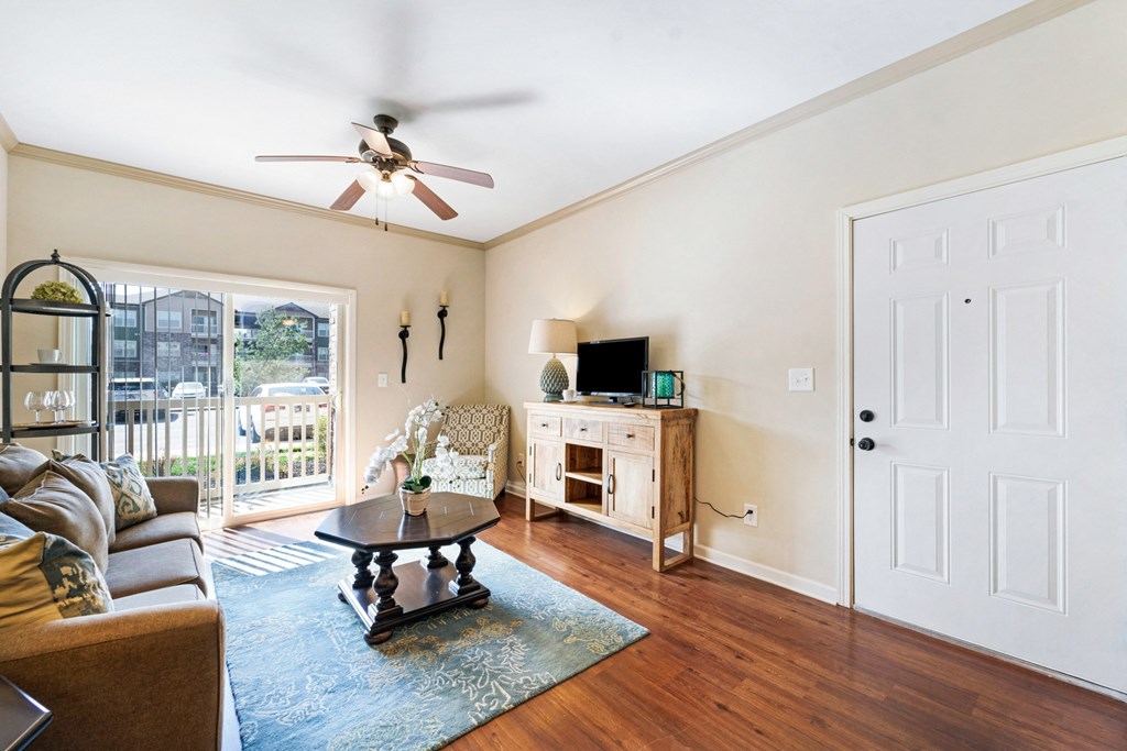Spacious Living Area with Hardwood-Style Flooring
