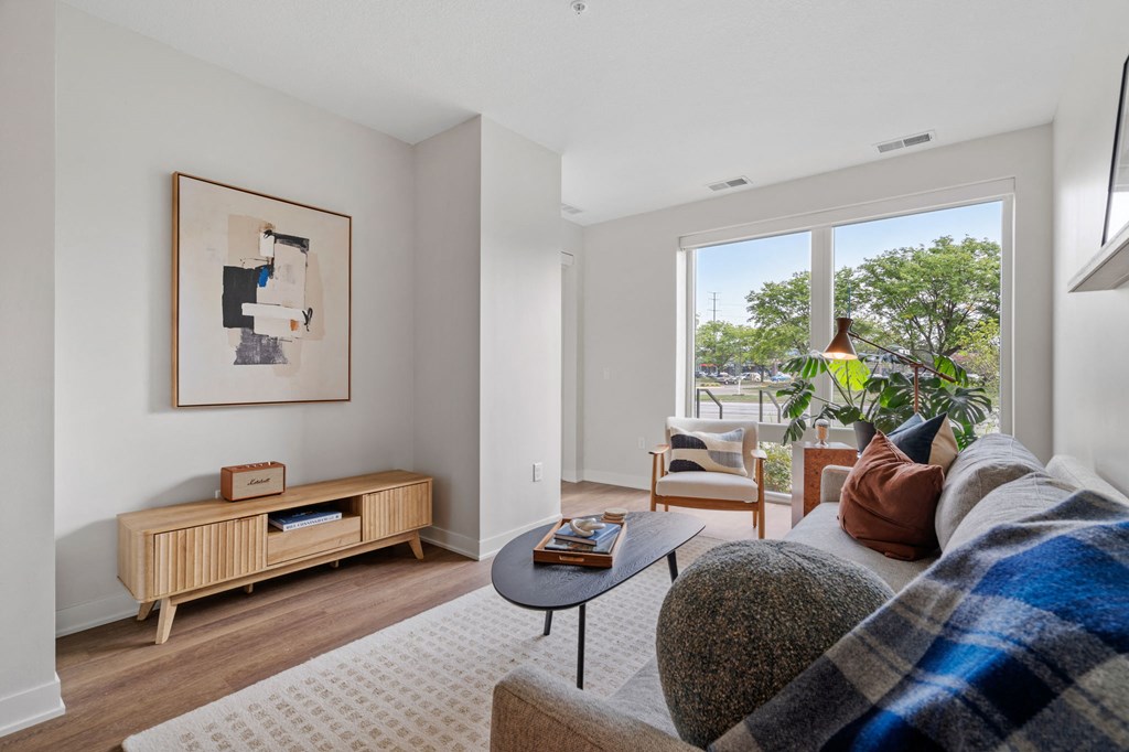 Living Room With Tall Ceilings & Sliding Glass Patio Door