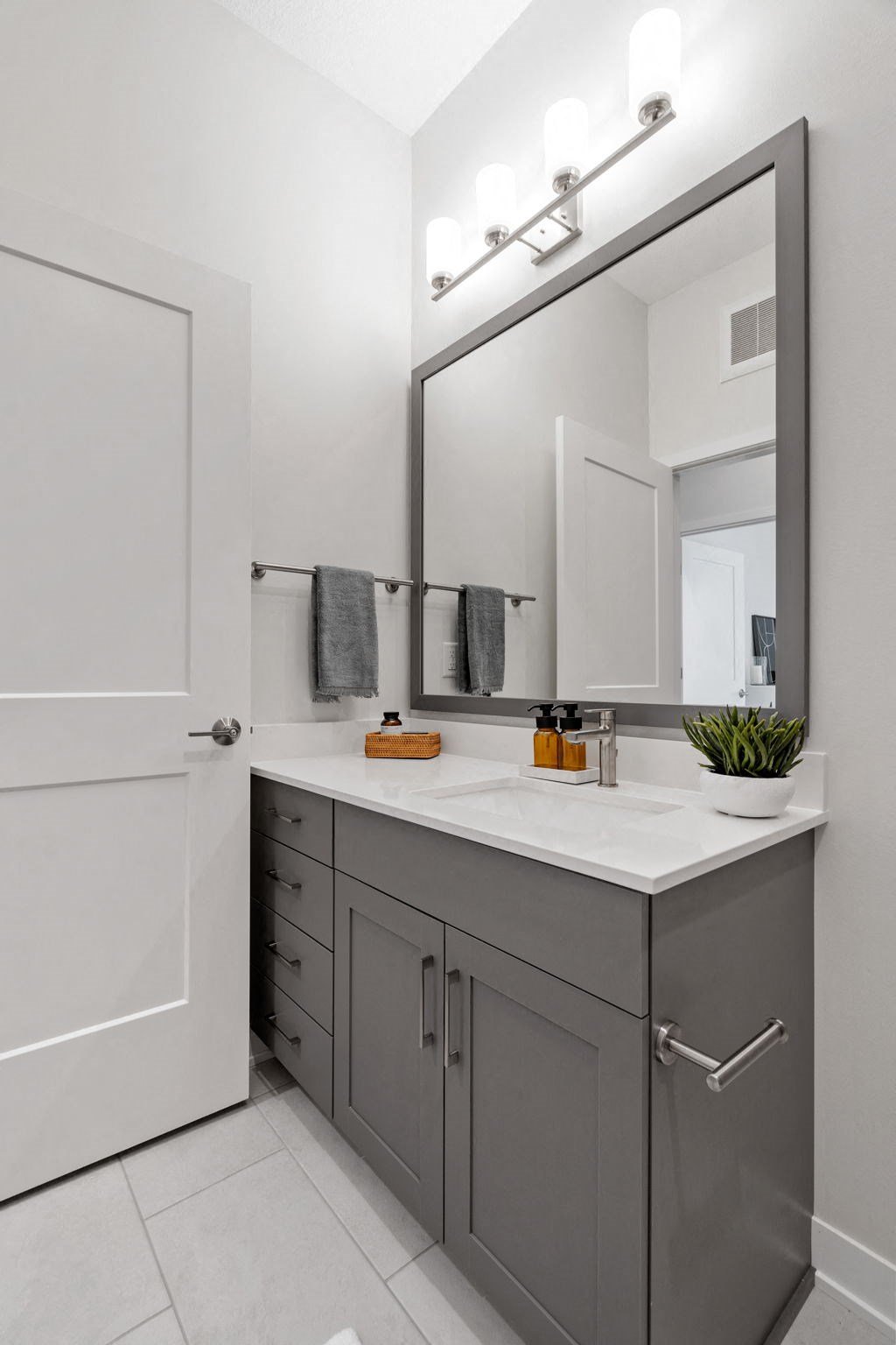 Bathroom Featuring Spacious Grey Vanity