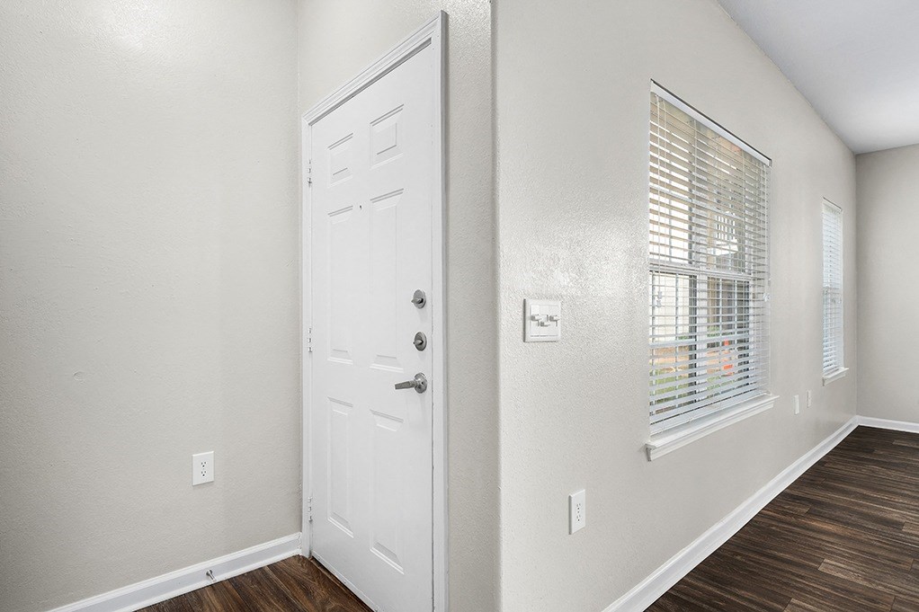 Front Door Entrance With Large Windows In The Living Area - Elms Floor Plan