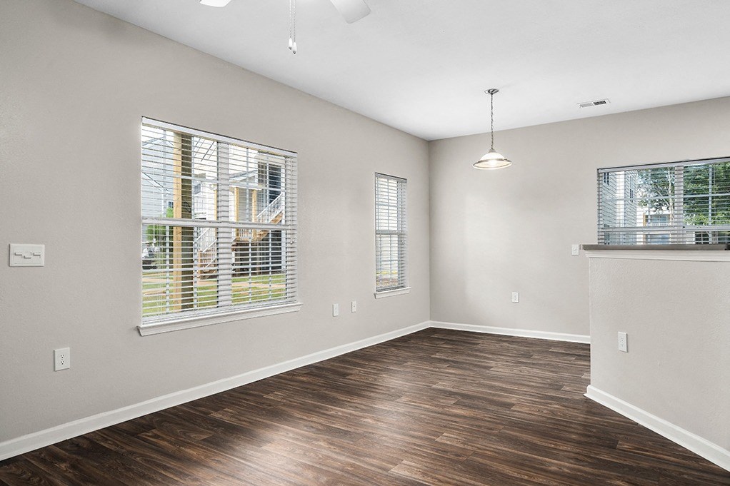 Open-Concept Living Room & Dining With Wood-Style Floors - Elms Floor Plan
