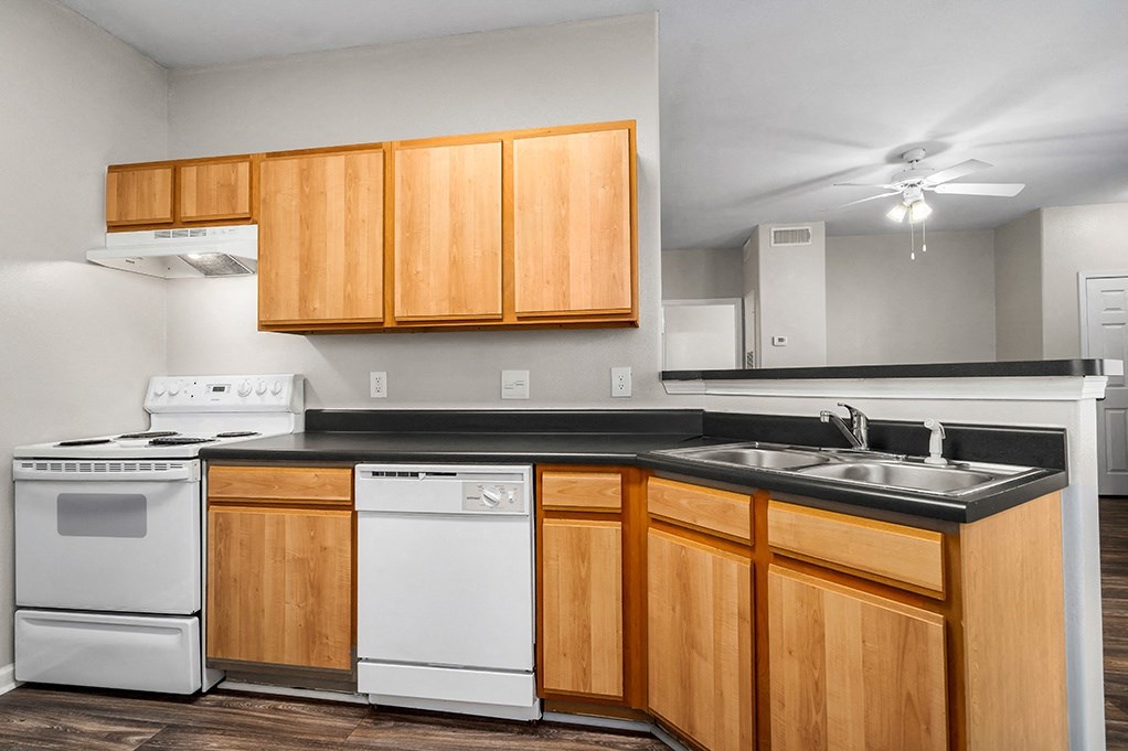 Fully-Equipped Kitchen With White Appliances - Elms Floor Plan