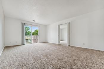 Spacious Living Area with Carpet