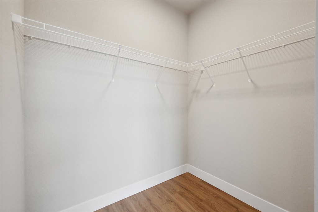 Walk-In Closet With Built-In Shelving