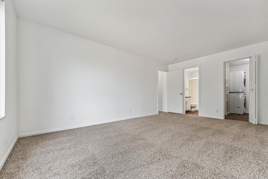 Spacious Bedroom with Plush Carpeting