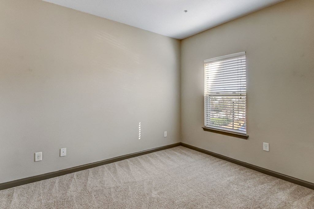 Spacious Bedroom with Plush Carpeting