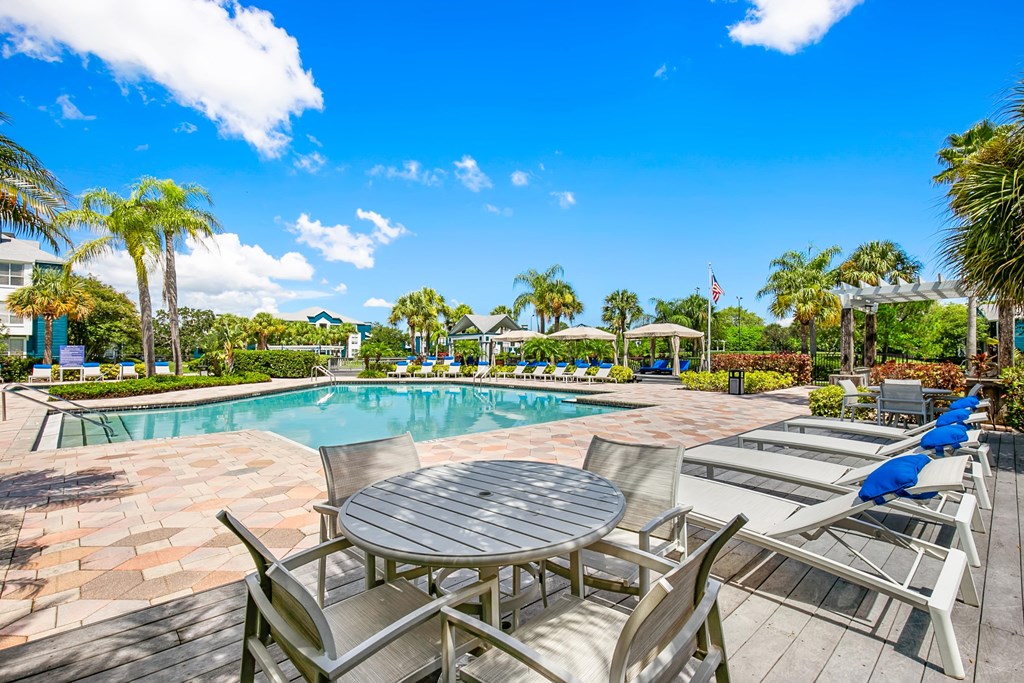 Tables & Chairs At The Pool Sundeck