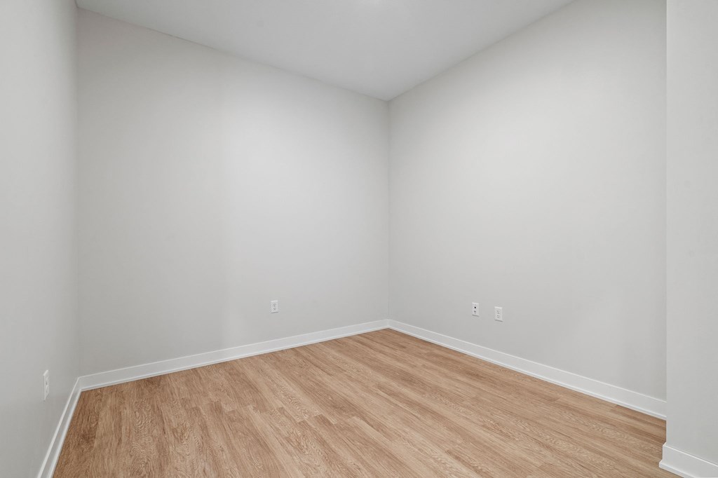 Den with Hardwood Flooring