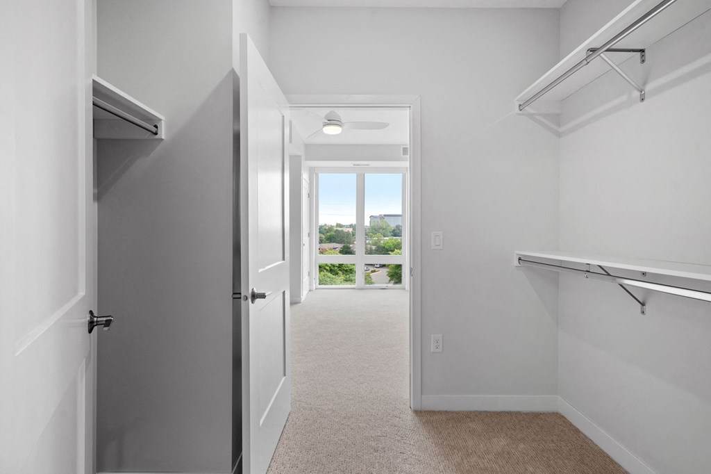 Walk-In Closet With Built-In Shelving