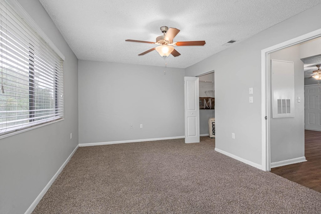 Spacious Bedroom with Plush Carpeting