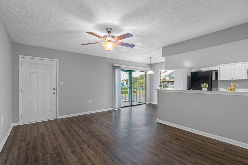 Spacious Living Area with Hardwood-Style Flooring