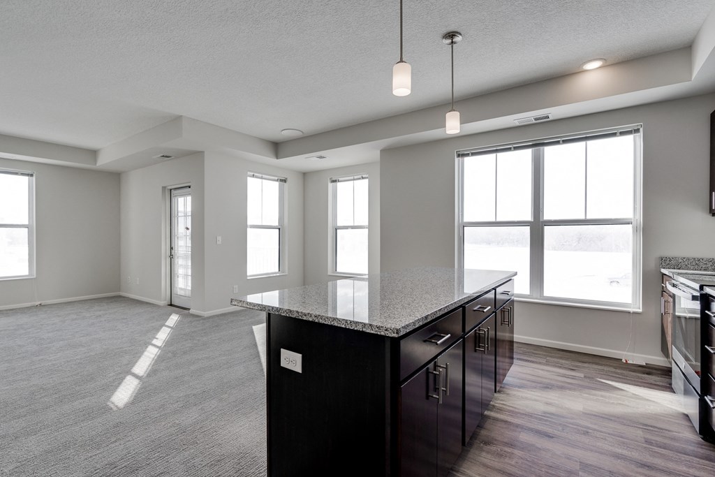 Spacious Kitchen With Large Granite Island