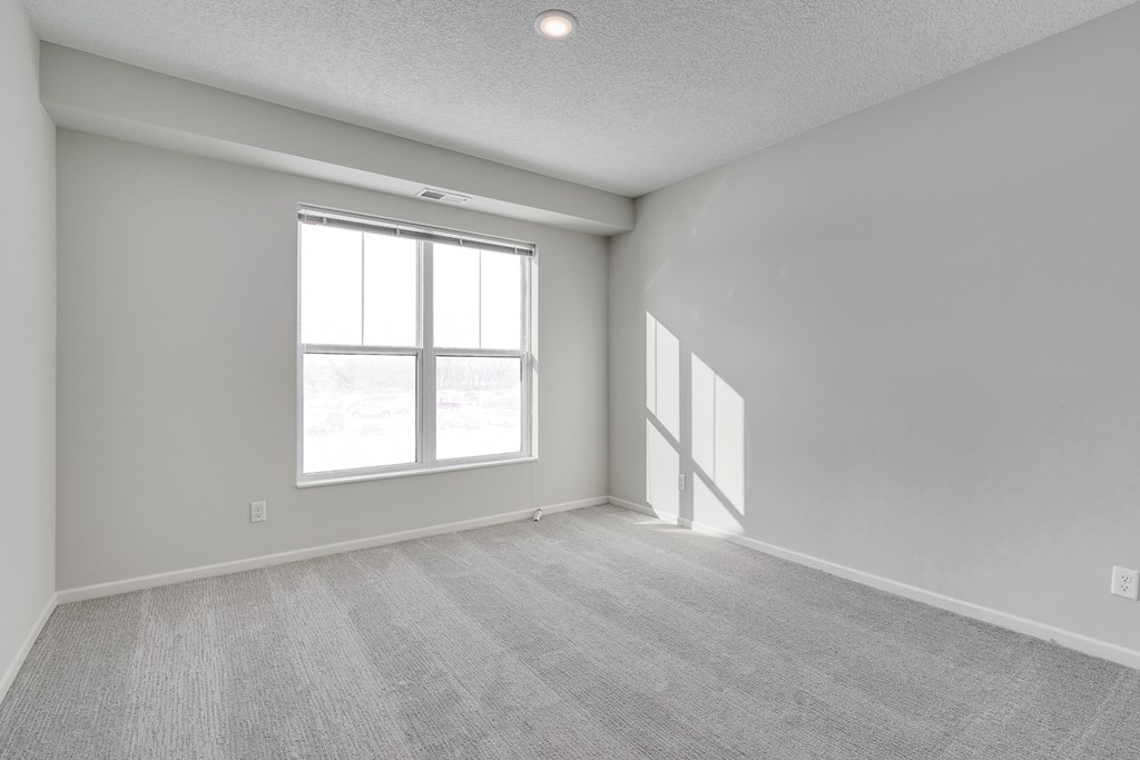 Bedroom With Large Windows