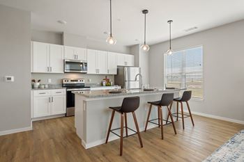 Fully-Equipped Kitchen with White Appliances
