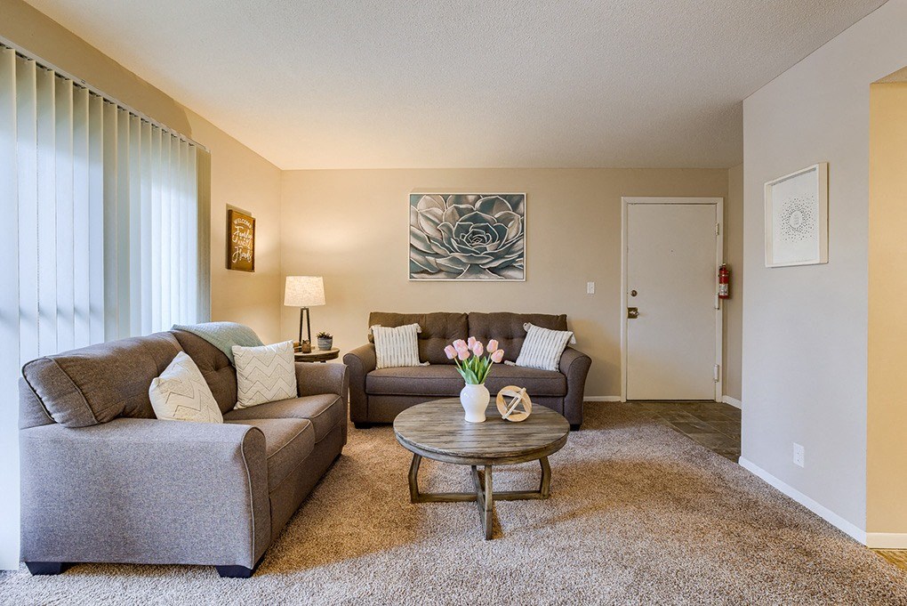 a living room with a couch and a coffee table