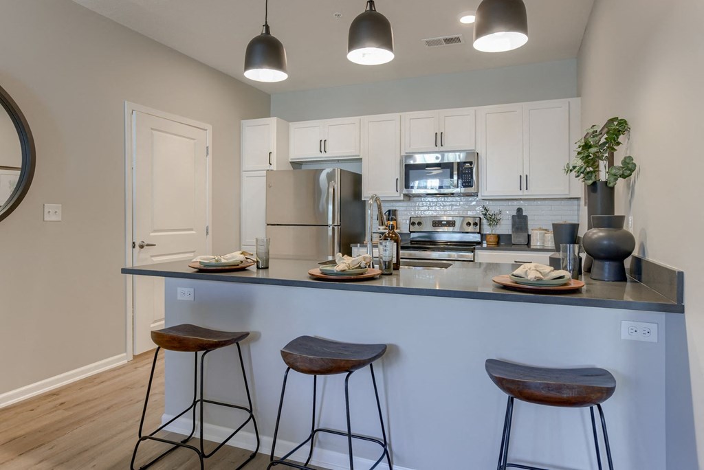 Kitchen with Counter Seating Overhang