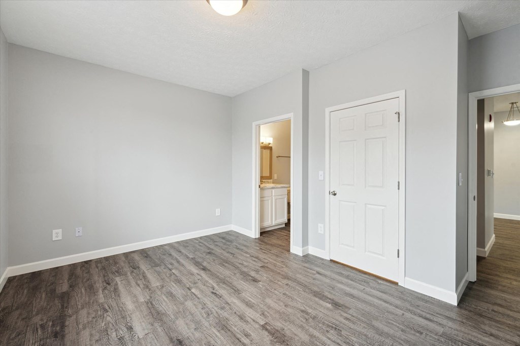 Bedroom with Wood Style Flooring