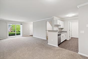 Spacious Living Area with Carpet