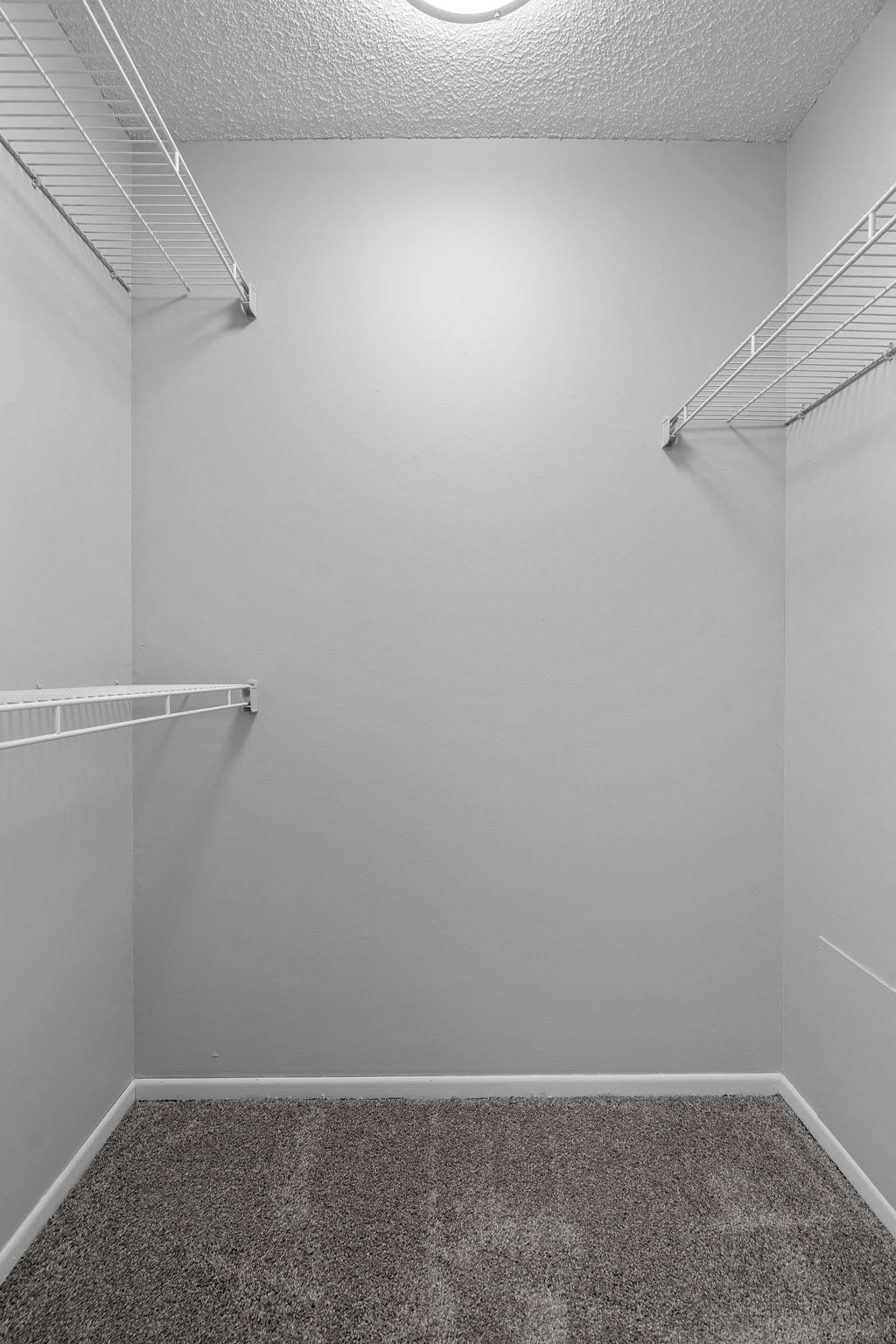 Walk-In Closet With Built-In Shelving