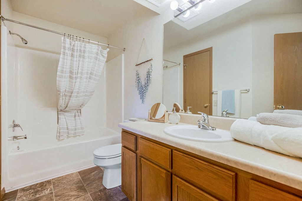 Spacious Bathroom With Large Vanity Countertop