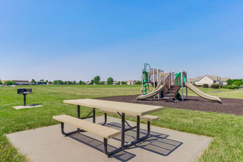 Picnic Table Near The Outdoor Playground Area
